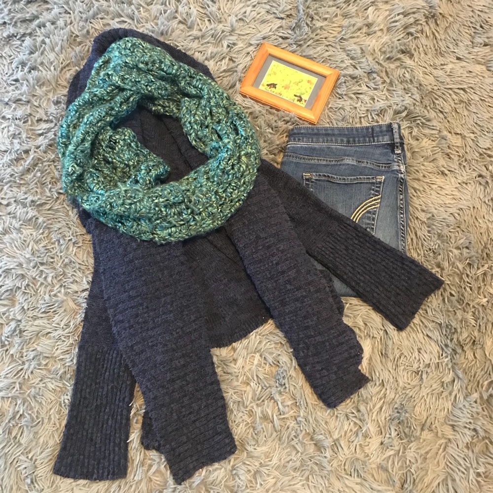 Blue and green hand knitted scarf.